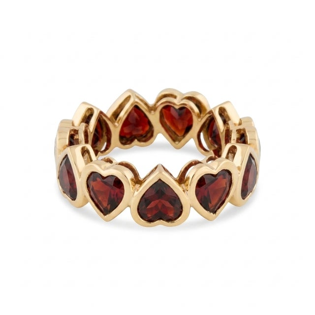 Celebrate your deepest affections with the timeless elegance of the eternity band. This exquisite piece showcases a...