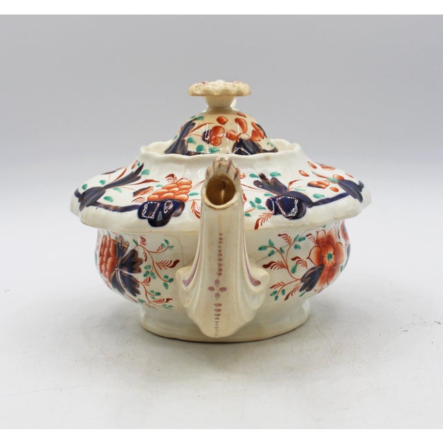 Circa 1850 Gaudy Welsh "Grape" Pattern Teapot, English, Staffordshire District. Rococo revival form with original cover....