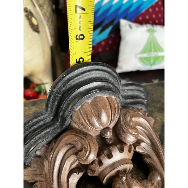 Up for consideration is a beautiful vintage pair of brown and black wooden wall sconces/brackets. These would look lovely...