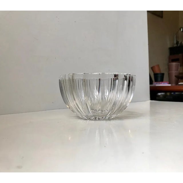 Based upon an Art Deco design from the 1940s this full lead clear crystal bowl from Kosta Boda in Sweden ticks all the...