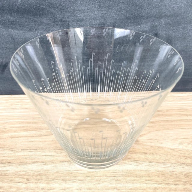 Crystal vase by Kaj Franck for Nuttajarvi Notsjo of Finland. Flared vase has wheel cut design on the side and around the...