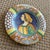 Vintage Deruta hand-painted portrait charger plate, made in Italy. Depicts a woman in rich oranges, greens, and blues....