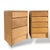 A charming mismatched pair of vintage bedside cabinets by Charter Furniture, crafted in warm blonde oak with a simple,...