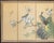 Circa 1970s Chinoiserie Style painted folding silk screen depicts a lovely scene with Peacock and two Doves on blossoming...