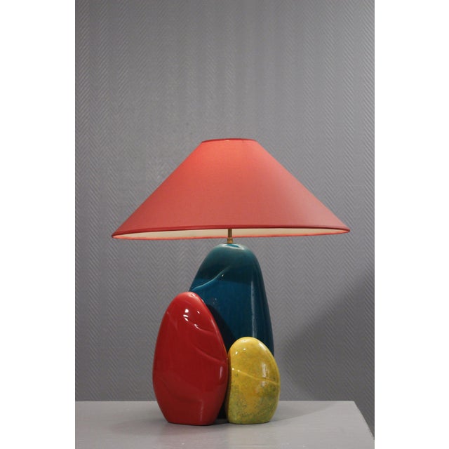 Large François Chatain lamp in speckled yellow, cobalt blue, and light red glazed ceramic, with its original lampshade....