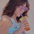 Sip by Rachel Linnemeier | Oil on wood Painting of a woman drinking a beverage with sunglasses. For Sale
