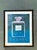 This striking framed poster is a celebrated intersection of high fashion and Pop Art, paying homage to the legendary...