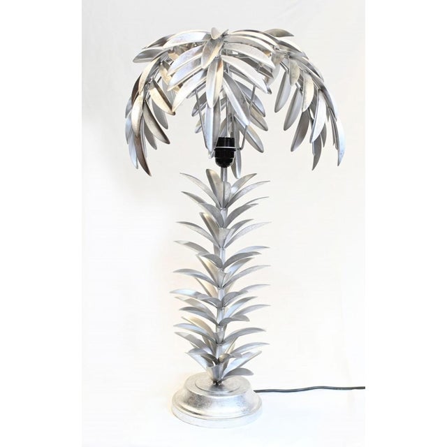 You are viewing an on trend of silver gilt palm tree table lamps these are in the classic hollywood regency style...