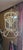 Chandelier in the shape of a hot air balloon, mid-20th century. A whimsical structure with arched metal rods forming an...