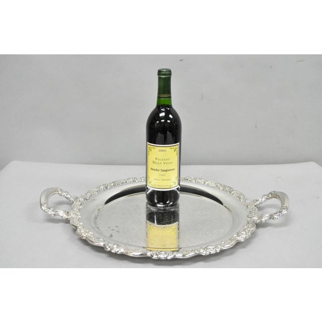 Vintage Oneida Silver Plated Round Twin Handle Serving Platter Bar Tray. Circa Mid 20th Century. Measurements: 2" H x...