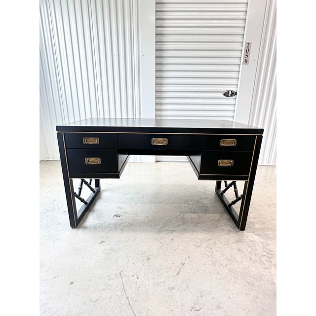 Elevate your workspace with this striking vintage campaign-style desk by the renowned Sligh Furniture. Crafted with a...