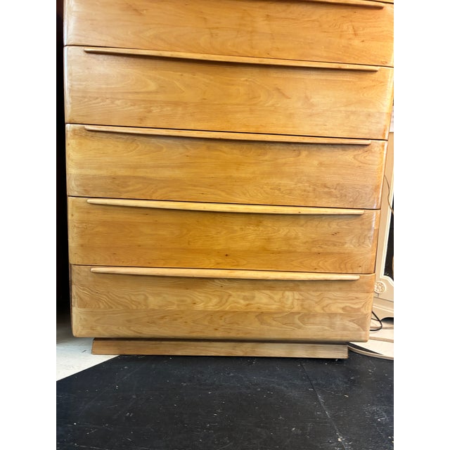 Mid-Century Modern solid birch 5 drawer dresser. The second highest drawer is divided into three compartments. The right...