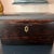 This is a gorgeous antique tea caddy box, likely English, in a beautifully grained Coromandel wood with a hand-made brass...