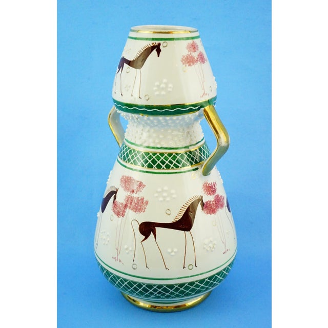 Measurements: height: 25 cm; diameter: 13 cm; weight: 0.863 kg item : a splendid double-bulb vase, with two small gilded...