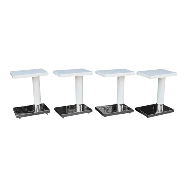 Beautifully refinished to perfection steel and white lacquer tables on casters, great for side or end tables, sofa tables,...