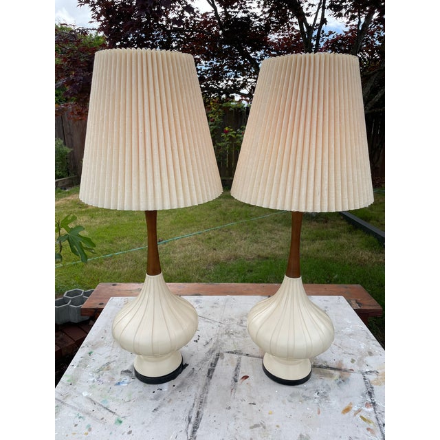 This captivating Mid-Century Modern table lamp, crafted and stamped by Fortune Lamp Co. 1966. Features an elongated...