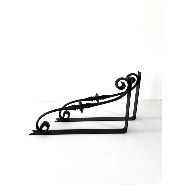 Beautiful and sturdy matching set of cast iron shelf brackets. Lovely classic scroll design, will go well with many...