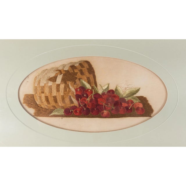 We are selling this great American needlework picture. This mid 19th century needlework features a basket with a group of...