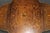 This exceptionally decorative Edwardian walnut and satinwood marquetry occasional table, dating to the late nineteenth or...