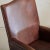 A Dutch armchair from the 1970s, upholstered in rich sheepskin leather with a warm patina and supple texture. Tapered,...