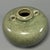 Fine antique Chinese celadon globular jar. Rounded bulbous body with two small loop handles at the shoulder, subtle carved...