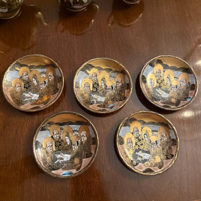 Extremely fine Satsuma China demitasse set, consisting of a pot with lid, sugar with lid, creamer with lid, 5 saucers and...