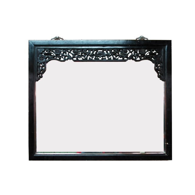 The frame of this vintage mirror is decorated with beautifully hand carved flowers and vines. This large Asian mirror will...