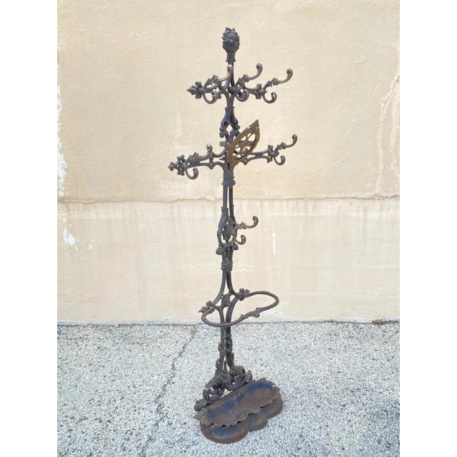 Antique Victorian Cast Iron Rococo Hall Tree Coat Hook Umbrella Stand. Item features multiple ornate hooks, removable cast...