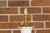 A pair of white porcelain vase shaped table lamps with textured décor and circular lucite bases. Elevate your home's...