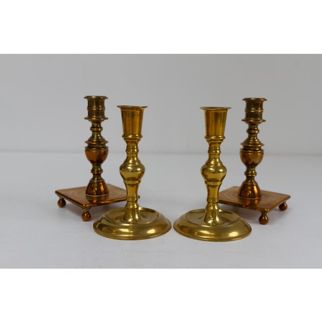 Antique Danish Brass Candlesticks. Set of 4. Set of four baroque style candle holders in solid brass from Denmark circa...