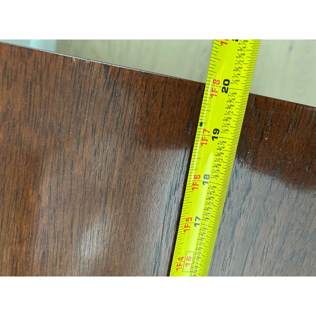 Very heavyweight and solid mahogany wood side table with brass accents. This comes from a 1970’ furniture collection...