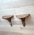 An elegant pair of vintage carved wood wall brackets by Decorative Crafts, Inc., each retaining its original company label...