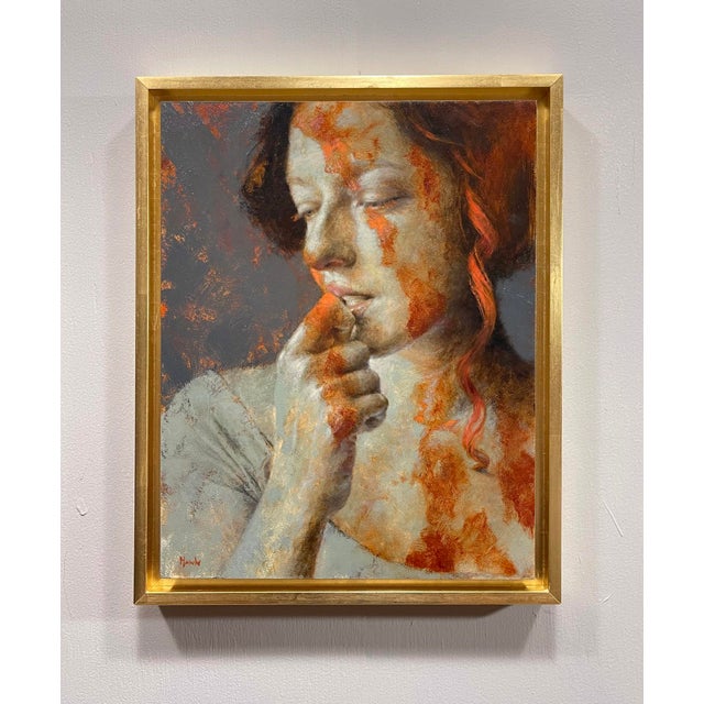 The artwork features a contemplative figure, partially obscured by vivid, textured hues that evoke a sense of...
