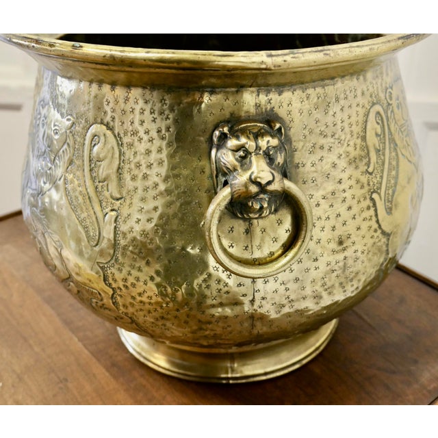 19th Century Gothic Brass Jardiniere with Shields This is a very old piece it is decorated with Lions and Shields and it...