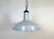 Industrial light blue ( grey ) enamel factory pendant light made in United Kingdom during the 1960s. White enamel inside...