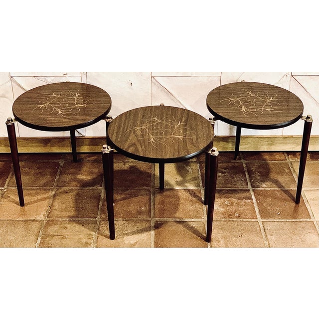 Trio of Vintage Mid-Century Modern Round Stacking Side Tables With an Abstract ‘Atomic Ranch’ Style Design on Top & Brass...