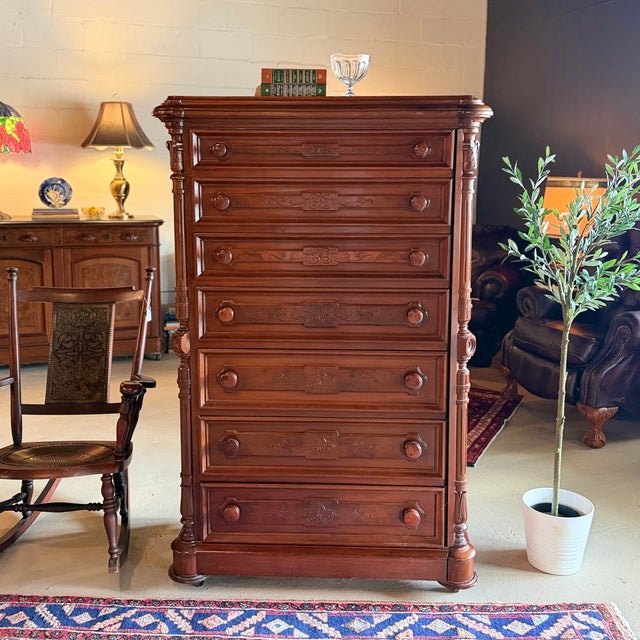 Large antique walnut chest of drawers in the Eastlake style with seven roomy drawers, original casters, and lovely pin &...