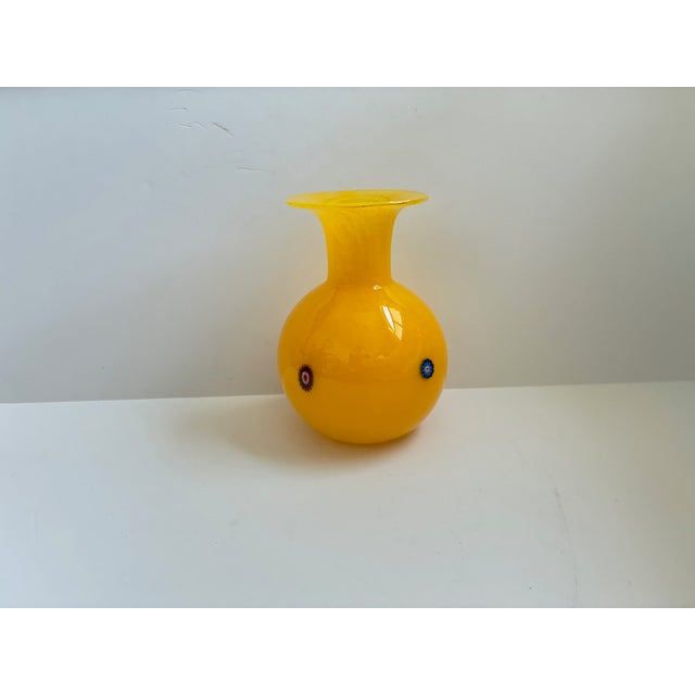 Vintage hand-blown Art Glass Yellow Murano vase with multi-color Millefiori. Signed on bottom. Made in Italy. . Circa...