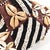 This intricately handwoven hat is covered in glass beads and cowrie shells. The Kuba beaded noble's hat with cowrie shells...
