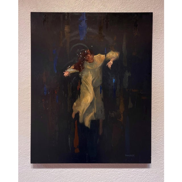 In "Adrift," a figure in a flowing, pale yellow garment floats gracefully against a dark, textured background, evoking a...