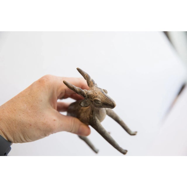 :: Vintage handmade African antelope sculpture. Circa mid 20th century, though possibly older, this piece has such...