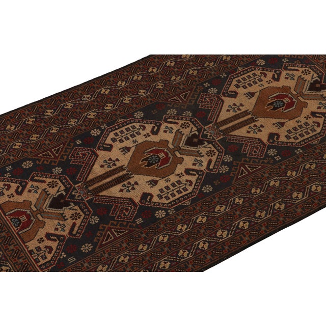 Hand-knotted in wool, this 3x6 Baluch Afghan runner of the 1950s is the latest to enter Rug & Kilim’s Antique & Vintage...