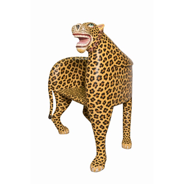 This striking vintage wooden bench is masterfully carved in the form of a Tiger, complete with a sculpted head and tail,...