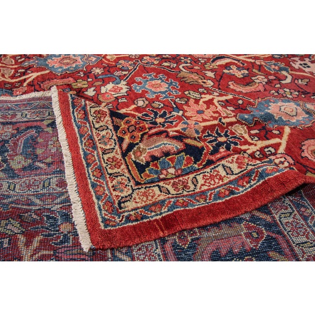 Beautiful vintage, hand-knotted wool, Mahal rug. This rug has a red field with an all over geometric design and...