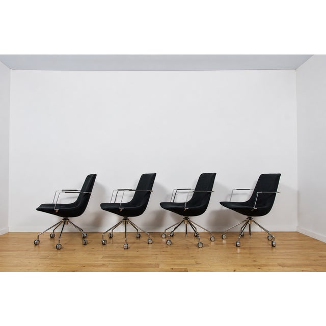 This set of four Comet conference chairs was designed by Gunilla Allard for the renowned Swedish manufacturer Lammhults in...