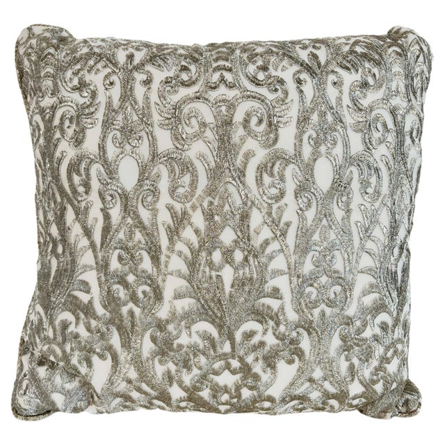 A luxurious Turkish decorative pillow featuring elaborate silver metallic sarma-style embroidery inspired by the sumptuous...