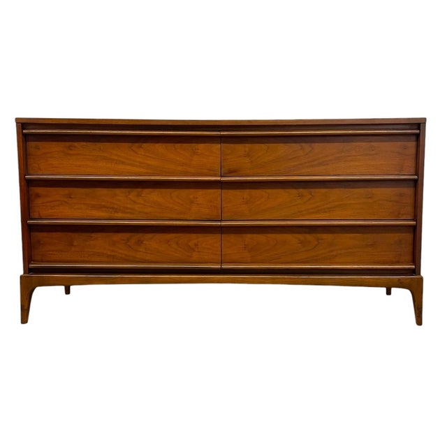 This Vintage mid century modern credenza, known for its clean architectural lines and emphasis on craftsmanship. The...
