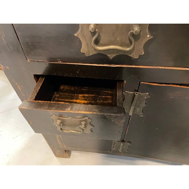 ASIAN EXPORT STYLE BLACK LACQUERED SIDEBOARD WITH BRASS HARDWARE -Substantial and richly finished Asian export–style...