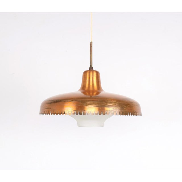 Copper pendant lamp produced by kemp & lauritzen in the 1940s. this special copper pendant lamp is a timeless design piece...