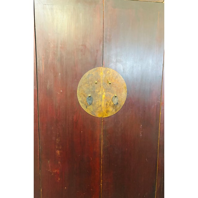 This antique Chinese Wedding Cabinet was traditionally used as a wardrobe or armoire. Made in the elegant Ming style, it...